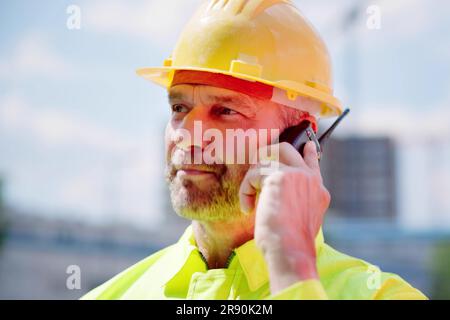 Inspection Engineer Worker At Construction Site Using Tablet Stock Photo