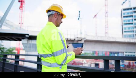 Osha Inspector At Construction Site. Young Engineer Worker Stock Photo