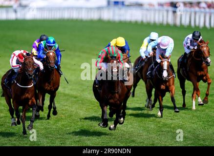 Okita Soushi ridden by jockey Ryan Moore (centre) on their way to winning the Duke of Edinburgh Stakes during day four of Royal Ascot at Ascot Racecourse, Berkshire. Picture date: Friday June 23, 2023. Stock Photo