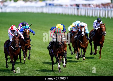 Okita Soushi ridden by jockey Ryan Moore (centre) on their way to winning the Duke of Edinburgh Stakes during day four of Royal Ascot at Ascot Racecourse, Berkshire. Picture date: Friday June 23, 2023. Stock Photo