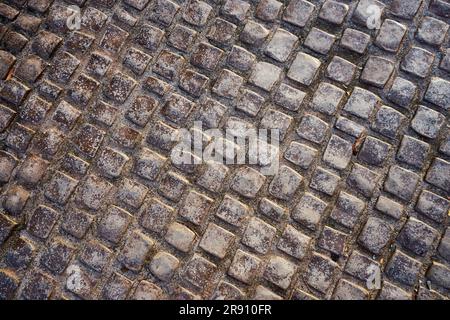 The texture of old cobblestone pavement Stock Photo