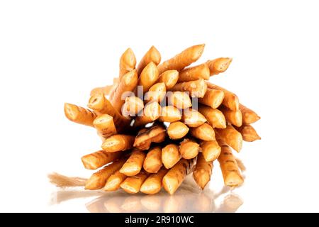 Straw is a bakery product. Several straws tied with jute thread isolated on a white background Stock Photo