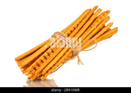 Straw is a bakery product. Several straws tied with jute thread isolated on a white background Stock Photo