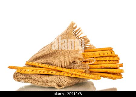 Straw is a bakery product. Several straws with a jute bag isolated on a white background Stock Photo