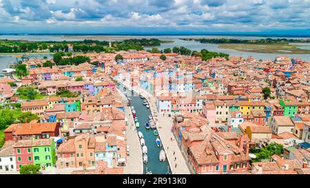 Burano island colorful houses aerial drone view from above, Venetian lagoon sea, Italy Stock Photo