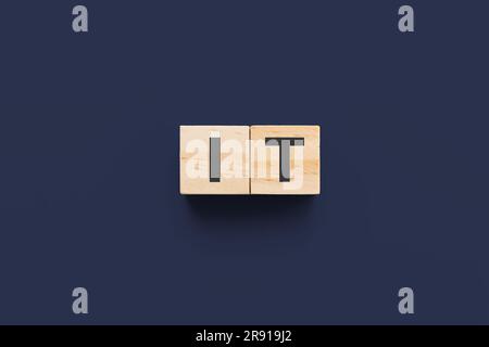 IT (information technology) wooden cubes on dark blue background Stock Photo