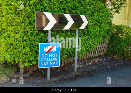Sign, do not follow sat nav, The English Lake District, Cumbria, in June, summer weather Stock Photo