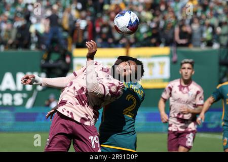 March 25, 2023; Portland, Oregon, USA; Portland Timbers Eryk Williamson (19) heads a ball against the Los Angeles Galaxy at Providence Park. Stock Photo