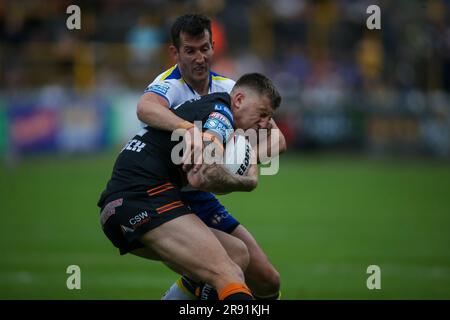 Castleford, UK. 23rd June, 2023. Stefan Ratchford of Warrington tackles Alex Mellor of Castleford *** during the Betfred Super League match between Castleford and Warrington Wolves at the Mend-A-Hose Jungle, Castleford, UK on 23 June 2023. Photo by Simon Hall. Editorial use only, license required for commercial use. No use in betting, games or a single club/league/player publications. Credit: UK Sports Pics Ltd/Alamy Live News Stock Photo