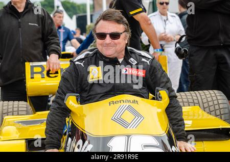 René Arnoux, French former racing driver who competed in 12 Formula One seasons from 1978. Squeezing into a Renault RS01 classic F1 car at Goodwood Stock Photo