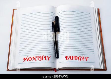 Business concept: handwriting in notebook on white background with space for text. Stock Photo