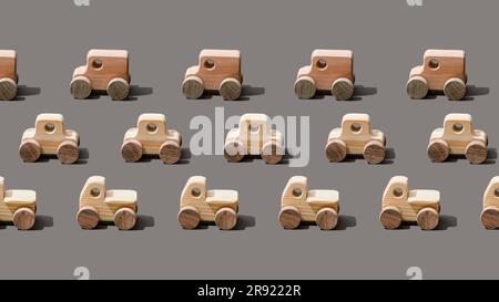 Different wooden cars on gray background Stock Photo