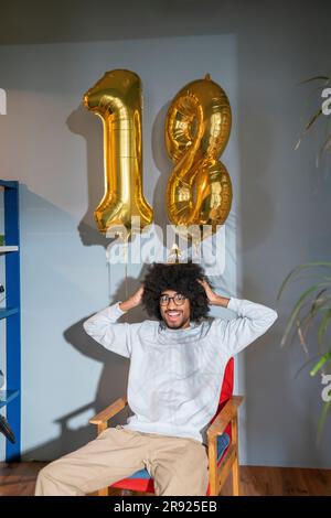 Happy man celebrating birthday at home Stock Photo