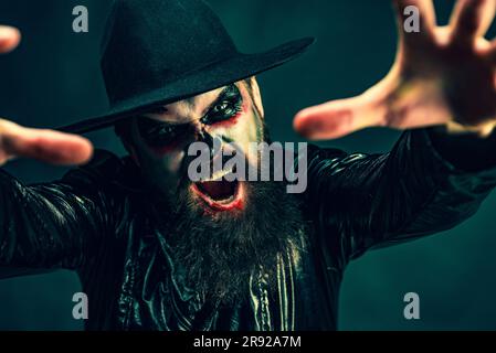 Design for Halloween banner. Halloween poster or banner. Halloween concept. Devil man with bloody face Stock Photo