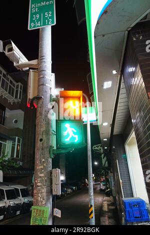 pedestrian traffic light with surveillance camera at night, Taiwan, Taipeh Stock Photo