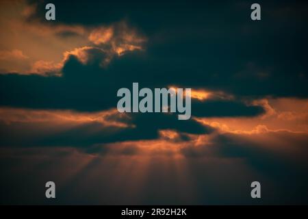 Dark Sunset in the sky with cloudscape cover Stock Photo