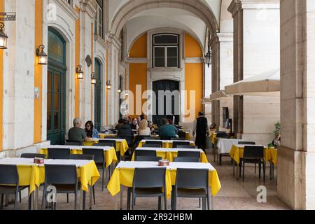 Lisbon, Portugal - March 8, 2023: Martinho Da Arcada, the oldest restaurant in Lisbon. Customers being served meals Stock Photo