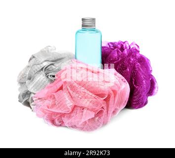 New shower puffs and bottle of cosmetic product on white background Stock Photo