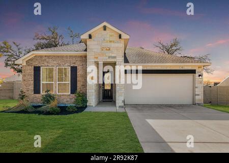 A home at sunset Stock Photo