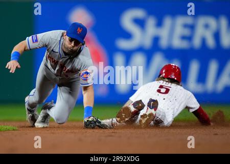 Philadelphia Phillies' Bryson Stott, right, is congratulated by Jean Segura  after hitting a home run against the San Francisco Giants during the fourth  inning of a baseball game in San Francisco, Saturday