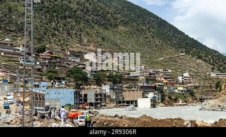 Heavy flood in river swat damaged the road and markets at bahrain swat valley: Bahrain swat, Pakistan - June 12, 2023. Stock Photo