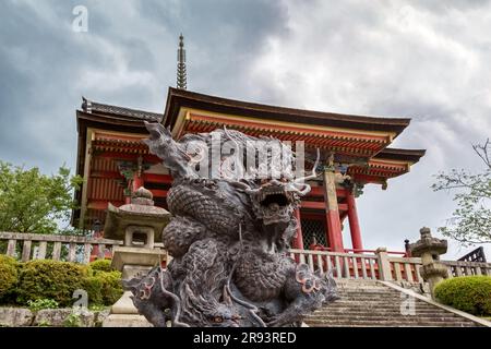 Closeup of an ancient bronze dragon statue outside of the Kiyomizu-dera temple on Mount Otowa, Kyoto, Japan. Image taken from a public street. Stock Photo