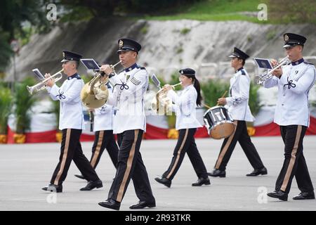 The marching band of Hong Kong Police Force march during the parade. A police passing out parade is held at the Hong Kong Police College. More than one hundred police officers have graduated from the Police College this month. The parade symbolize they have finished their studying at the police college and become a formal police officer from now on. The Deputy Commissioner of Police (Operations), Mr Yuen Yuk-kin,  was the reviewing officer at the passing-out parade of probationary inspectors and recruit police constables. (Photo by Michael Ho Wai Lee / SOPA Images/Sipa USA) Stock Photo