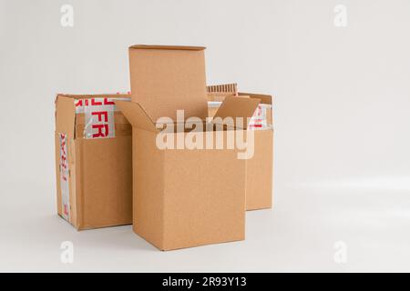 Empty cardboard boxes isolated on the white background Stock Photo