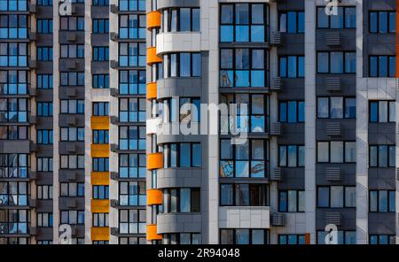 full-frame view of freshly built high rise apartment building in white ...