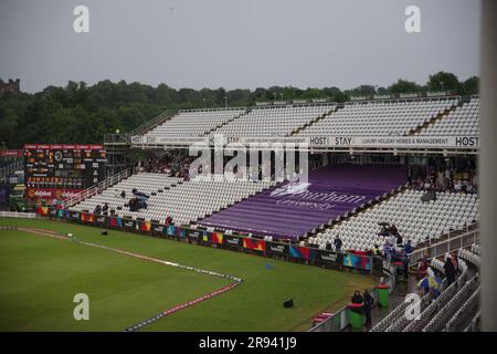 Chester le Street, 23 June 2023. Spectators sheltering from the rain at the Vitality Blast match between Durham Cricket and Yorkshire Vikings at Seat Unique Riverside, Chester le Street. Credit: Colin Edwards Stock Photo