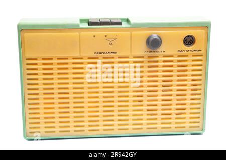 Old transistor radio isolated on white English translation: programs, volume, tape recorder (inscription in Russian) Stock Photo