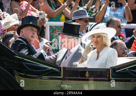 Ascot, Berkshire, UK. 23rd June, 2023. King Charles and Queen Camilla in their carriage. The Royal Procession with the Royal family and their guests in carriages makes its way through the parade ring at Royal Ascot on Day Four of the horse racing event. Members of the Royal family then mingle on the lawn before moving to the Royal enclosure. Credit: Imageplotter/Alamy Live News Stock Photo