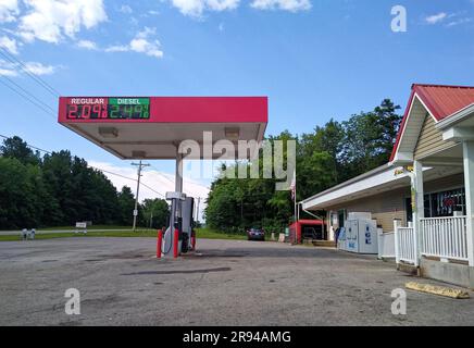 Current fuel prices for diesel and regular unleaded gasoline are displayed on a gas station awning amid an empty parking lot on Wednesday, June 24, 2020 at the Speedy Mart convenience store in Falls of Rough, Grayson County, KY, USA. The rate at which gas prices are increasing across the country is slowing, according to a report released by the American Automobile Association, with the national average cost of a gallon of unleaded gasoline increasing by three cents to $2.13 for the week ended June 22, 2020. (Apex MediaWire Photo by Billy Suratt) Stock Photo