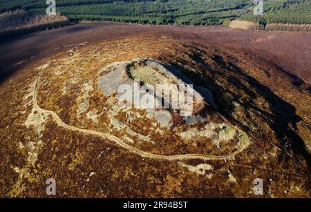 Tap o’ Noth prehistoric hillfort Grampian, Scotland. Massive vitrified wall of Neolithic core. Outer rampart encloses large early Medieval settlement Stock Photo