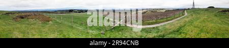 Cairnpapple prehistoric site W. of Edinburgh. Panoramic here includes R to L burial mound, Traprain Law, Fife, Firth of Forth toward Loch Lomond hills Stock Photo