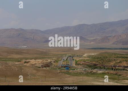 June 22, 2023, Jolfa, East Azerbaijan, Iran: A view of the Aras UNESCO Global Geopark in northeastern Azerbaijan province, northwest of Iran. The Aras River forms the northern boundary of the geopark, serving as the dividing line between Iran, Armenia, and Azerbaijan. Within the geopark region, there are three designated protected areas. The area's conservation efforts are significantly influenced by its rich wildlife variety and the existence of endangered species like the Caucasian Black Grouse, Red Deer, Armenian Ram, and Leopard. (Credit Image: © Rouzbeh Fouladi/ZUMA Press Wire) EDITORIAL Stock Photo