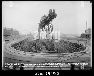 Floating Crane Hercules and Three Destroyers in Dry Dock Number 4 Looking Northeast. Glass Plate Negatives of the Construction and Repair of Buildings, Facilities, and Vessels at the New York Navy Yard. Stock Photo