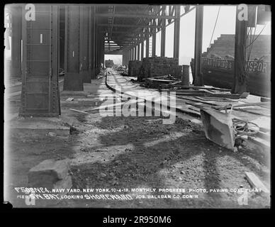 Monthly Progress Photo, Paving Coal Plant Pier, Southwest Bay, Looking Shoreward, Joseph Balaban Company, Contractor. Glass Plate Negatives of the Construction and Repair of Buildings, Facilities, and Vessels at the New York Navy Yard. Stock Photo