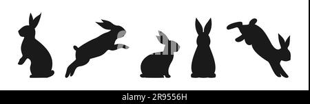 Black silhouettes of easter bunnies isolated on a white background. Vector illustration Stock Vector