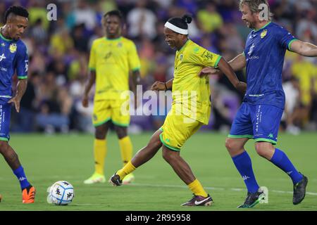 June 23, 2023: Team Ronaldinho ROLANDINHO (10) passes the ball during the The Beautiful Game Team Ronaldinho vs Team Robert Carlos soccer match at Exploria Stadium in Orlando, Fl on June 23, 2023. (Credit Image: © Cory Knowlton/ZUMA Press Wire) EDITORIAL USAGE ONLY! Not for Commercial USAGE! Stock Photo