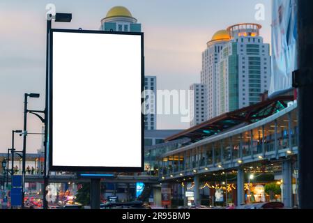 Big Blank billboard with copy space for your text message or content in center of city. Stock Photo