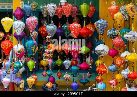 Traditional, colourful paper lanterns on display outside a shop in old town Hoi An, Vietnam. Stock Photo