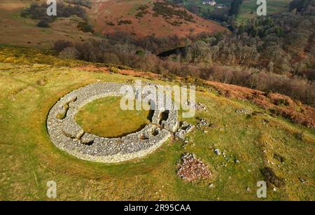 Edins Hall Broch above Whiteadder Water. Borders region, Scotland. Showing stone footings, intramural chambers and entrance of 2nd C broch. Aerial Stock Photo