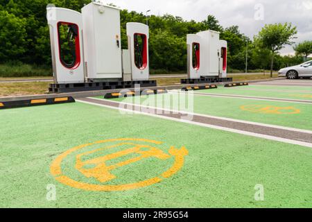Electric car charging station on a street. Stock Photo