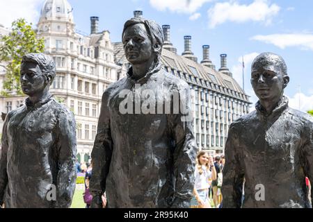 London, England, UK 24 June 2023 Protesters against Julian Assanges continued incarceratiion gather at the Anything to Say statue by Italian artist Davide Dormand in Parliament Square. The stautue depicts the whistleblowers Edward Snowdon, Julian Assange and Chelsea Manning with a fourth chair kept empty for public speaking. Speakers included Wikileaks editor Kristinn Hrafnsson and Julian Assanges partner Stella Moris Stock Photo