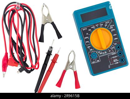 crocodile clip wire clamps for recharge battery car and Multimeter isolated on white desk Stock Photo