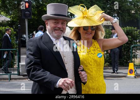 Ascot, UK. 23rd June, 2023. Racegoers arrive for the fourth day of Royal Ascot. Each Royal Ascot enclosure has a different Dress Code, with the strictest applying to the Royal Enclosure, but a few restrictions apply to all enclosures. Credit: Mark Kerrison/Alamy Live News Stock Photo