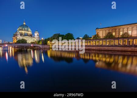 The Berlin Cathedral and the Old National Gallery on Museum Island in Berlin by night Stock Photo