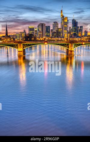The Main with the famous Frankfurt skyline after sunset Stock Photo