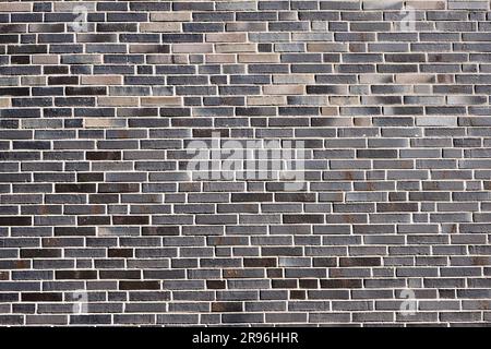 Background from a new grey brick wall Stock Photo